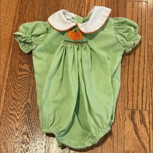 Green Baby Bubble Romper with White Collar and Pumpkin Smocking Detail